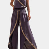 Donatila Unique Jumpsuit with Golden Details and Open Leg