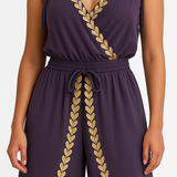Donatila Unique Jumpsuit with Golden Details and Open Leg